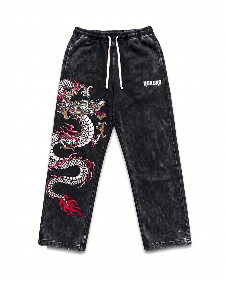 HOKURO dragon embroidered sweatpants, front